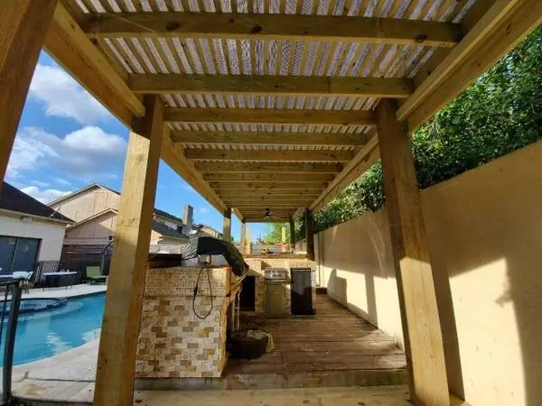 Covered patio by Handyman Services