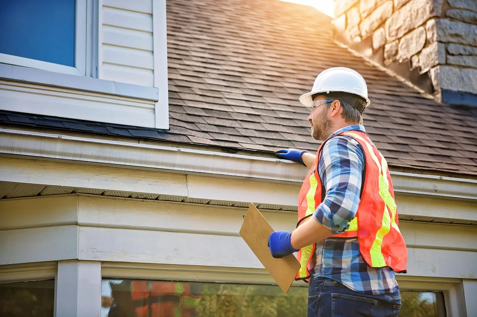 Roofer at work on a Houston home