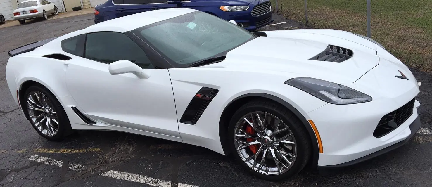 White Corvette on custom wheels