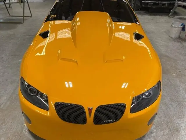 Yellow muscle car painted by Performance Auto Painting