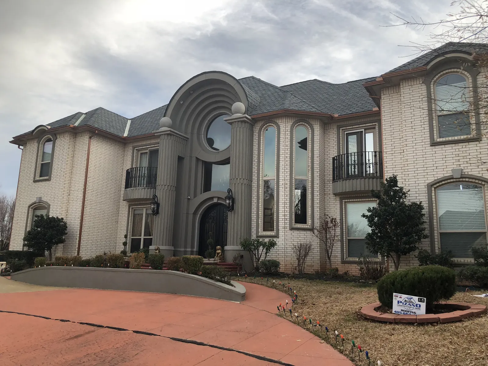 Two-story home with a new shingle roof