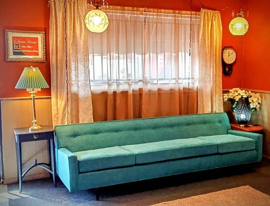 Teal mid-century sofa reupholstered