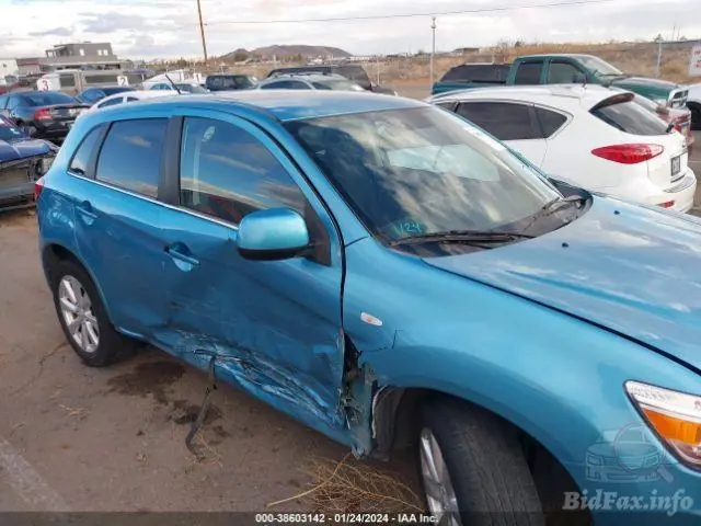 Blue SUV with collision damage, before repair